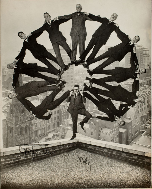 Man on Rooftop with Eleven Men